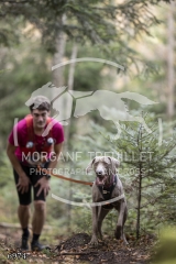 6974