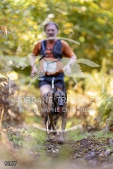 9957